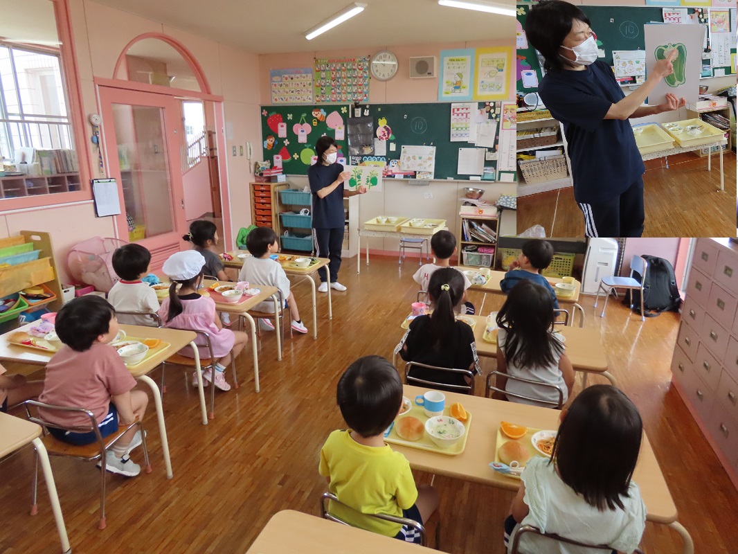 給食の先生からピーマンの説明を聞きます